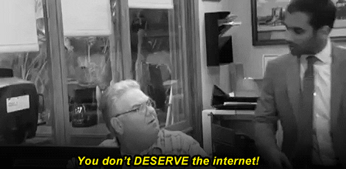 GIF of Parks & Rec character Tom walking away from Larry saying "You don't deserve the Internet!"