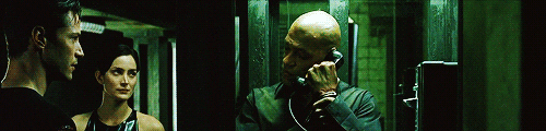 Gif from the movie matrix - morpheus disappears from matrix when picked up the phone