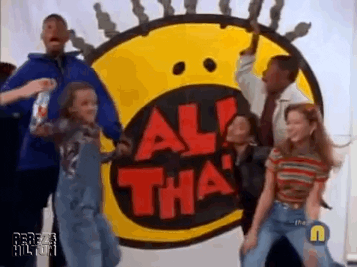 The All That cast dancing in front of the show's logo.