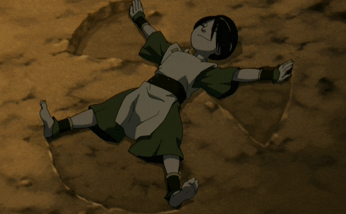 toph making a dirt angel