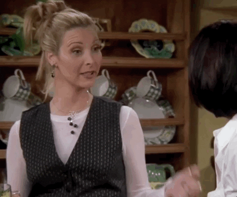 Gif da personagem Pheeb, da série Friends, fazendo sinal de positivo.