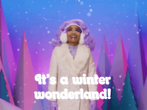 Festive Feature: A person twirling in a Winter Wonderland against a purple forest backdrop. 