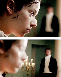 A two-panel GIF of Anne and Wentworth from the 2007 BBC production of Persuasion. The top GIF is a close-up of Anne's profile in the foreground as she plays the piano; in the background is a blurred figure of a man in a doorway. The bottom GIF shifts focus to Wentworth in the background, watching Anne as she plays.