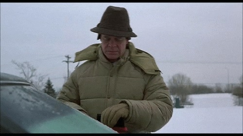Angry man trying to de-ice his windshield (GIF)