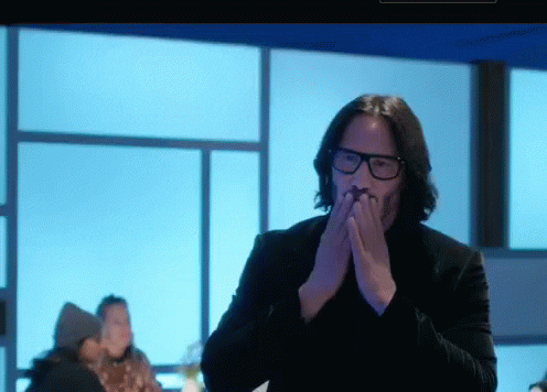 Keanu Reaves gesturing thank you from giphy