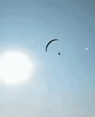 A smooth paraglide landing in sports gifs