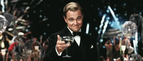 Leonardo DiCaprio raises a toast in The Great Gatsby