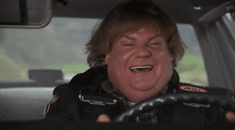 Chris Farley laughing then serious 