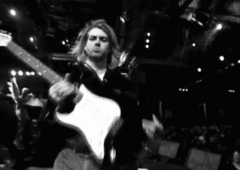 Resultado de imagem para kurt cobain tocando guitarra gif