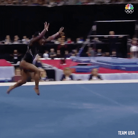 Simone Biles does a floor routine at the Olympics