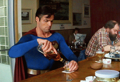 reaction superman drinking alcohol shot