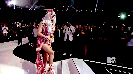 Lady Gaga wearing the meat dress accepting a MTV award.