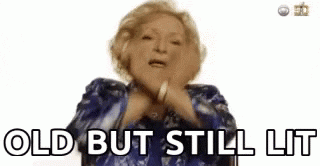 A GIF of Betty White dabbing with the caption 'OLD BUT STILL LIT'