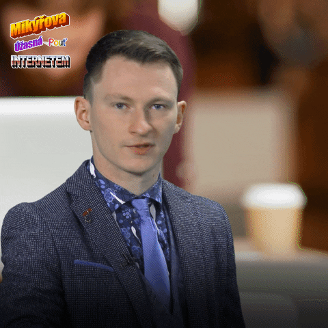 Muž v obleku s kamennou tváří a titulkem „Kdo by to čekal?“ jako ironická reakce na bezplatnou verzi, která nikoho nepřesvědčila