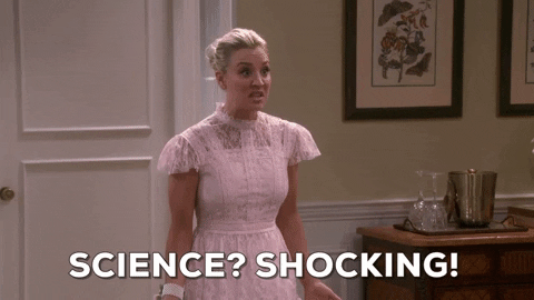 A GIF of a woman in a white dress saying "Science? Shocking!".