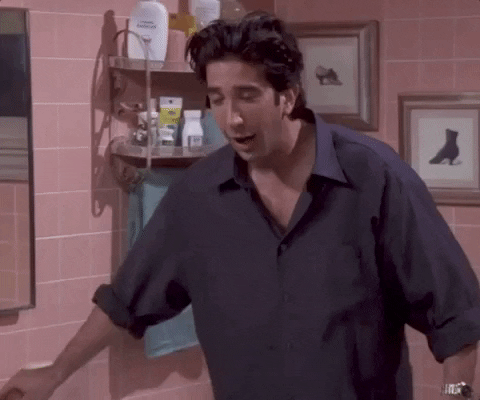 GIF of Ross from Friends when wearing leather pants, experiencing utter relief. 