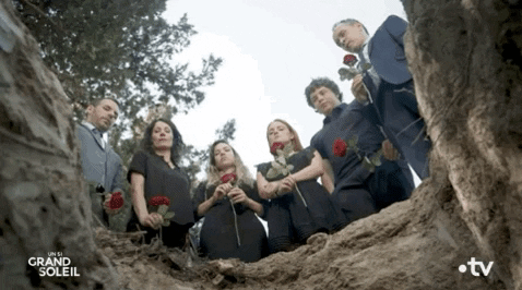 Rose being thrown into a burial site