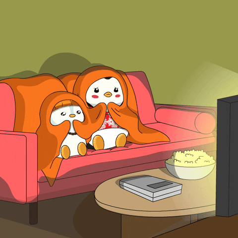 Penguins watching TV