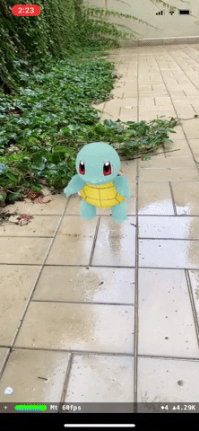 Screen recording of an iPhone using AR technology to spawn a virtual Squirtle