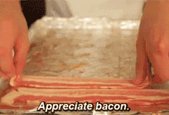 Gif of bacon strips being laid out on a foil-wrapped baking sheet. "Appreciate bacon".
