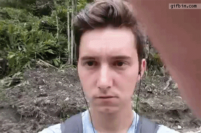 Guy taking a selfie beside railway tracks. Gets hit in the face by the shoe of a passing train's driver.