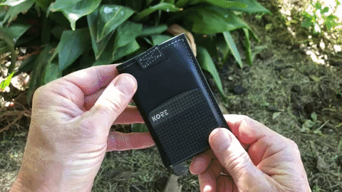 GIF of ejecting cards from the Kore Slim card holder. 