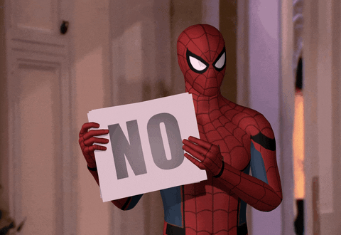 Spider-man holding up placards that say “no”