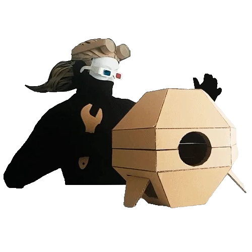 Masked figure beside a handmade hexagonal cardboard drone