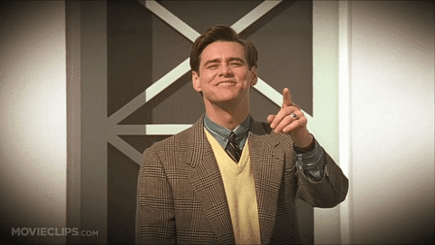 American actor, Jim Carrey pointing and laughing