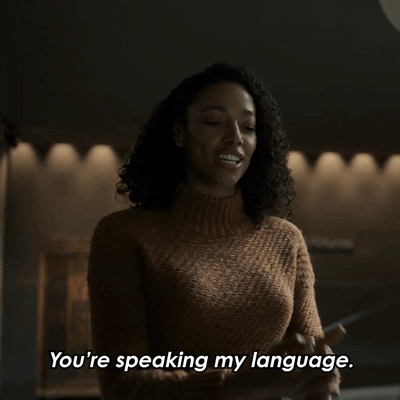 Gif of Black woman with shoulder length curly hair saying "You're speaking my language"