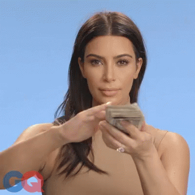 nothing worth having comes easy: Kim Kardashian throwing money GIF