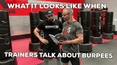 Trainer explaining burpees for those that need extra coaching