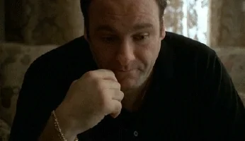 Tony Soprano rubbing his face in despair