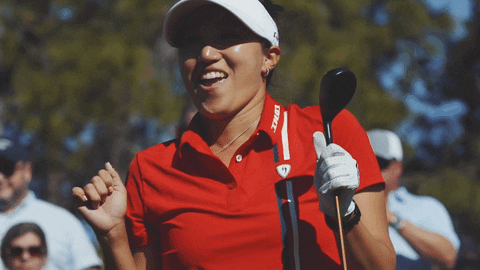 A gif of a professional golfer making a celebratory fist after sinking a very important putt