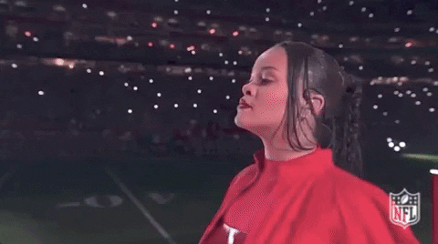Rihanna walkking at NFL