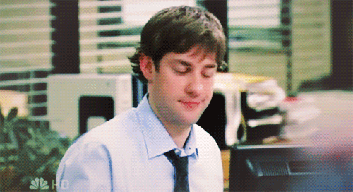 Gif of Jim and Pam from The Office doing an air high five