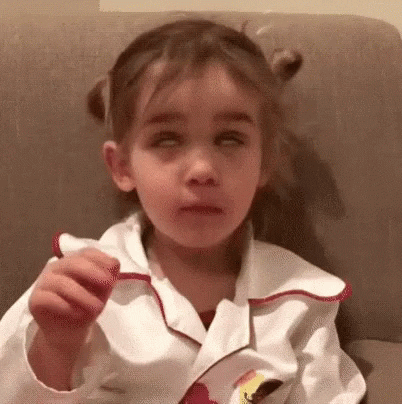 little girl rolling her eyes and waving her hands in a "whatever" gesture