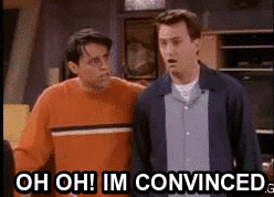 Chandler en Joey staan naast elkaar en Chandler zegt sarcastisch 'oh oh! Im convinced