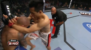 Korean Zombie sweeps and attacks submissions against Dustin Poirier