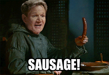 Guy-holds-sausage
