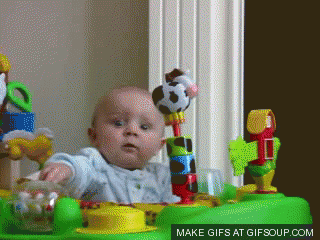gif of baby looking terrified then laughing