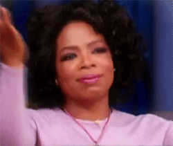 Oprah happy and content gif