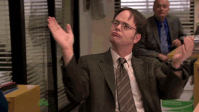 A GIF of Dwight Schrute from The Office clapping