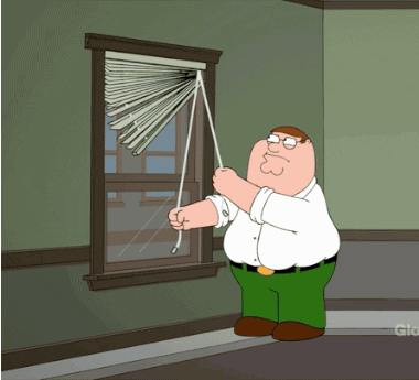 A man attempting to close window shades animated gif