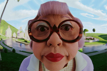 Mrs. Kwan, a woman with glasses and a pink hat at a Quinceanera