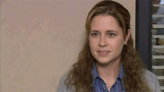 GIF of Pam from the Office Smiling and Crying 