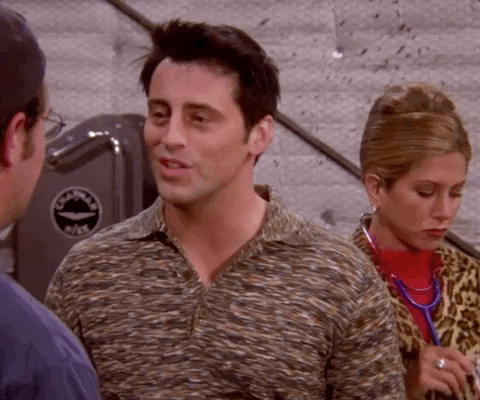 GIF of Joey from Friends saying "You have got to listen" to Chandler with Rachel in the background. 