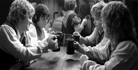Hobbits sharing a drink