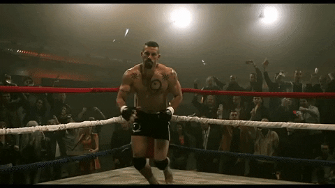 A GIF of a boxer landing a big punch