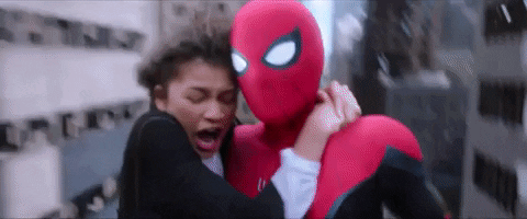 Spiderman and MJ swinging through New York City GIF